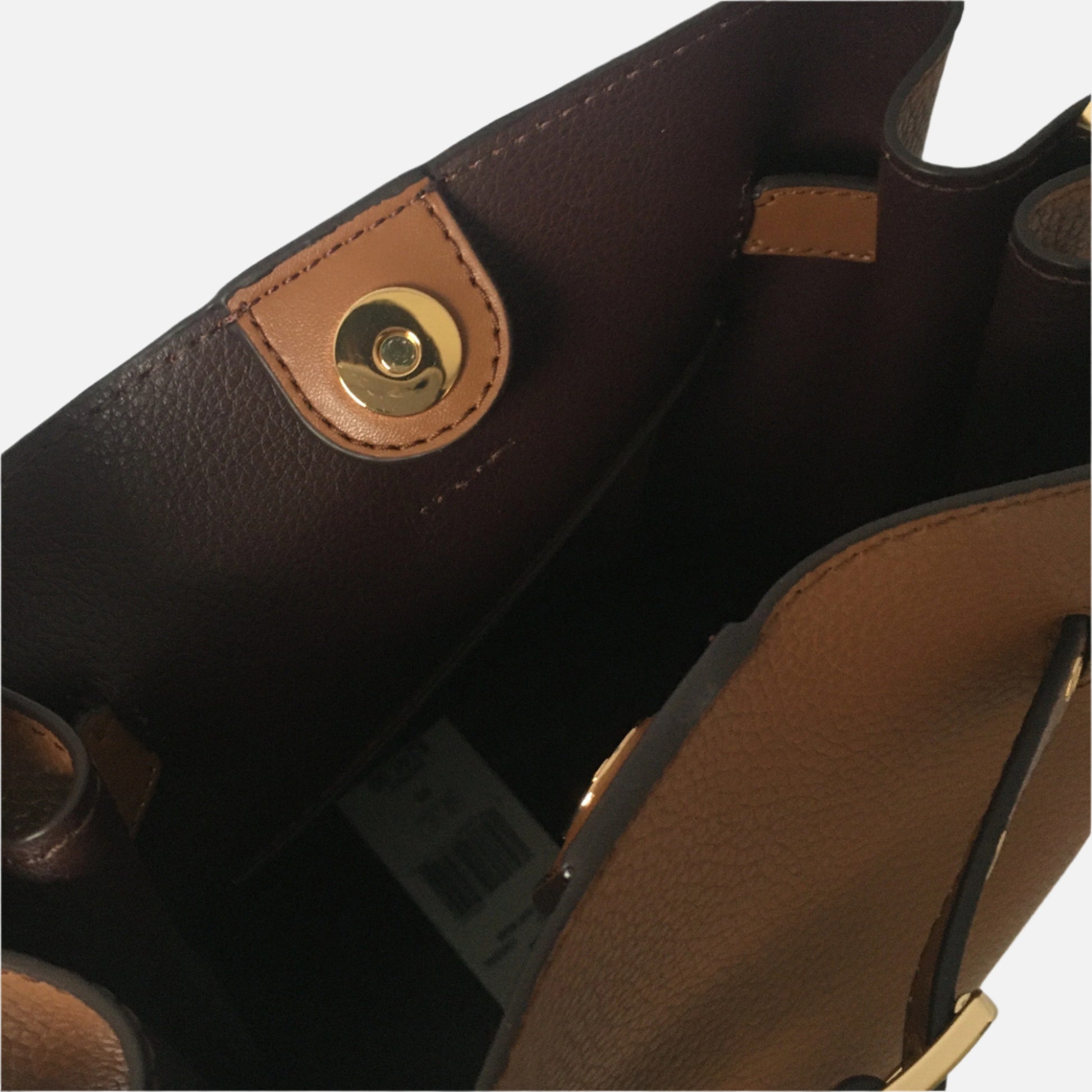 Michael Kors Emilia designer crossbody bags. Leather interior with gold coloured stud snap closure.