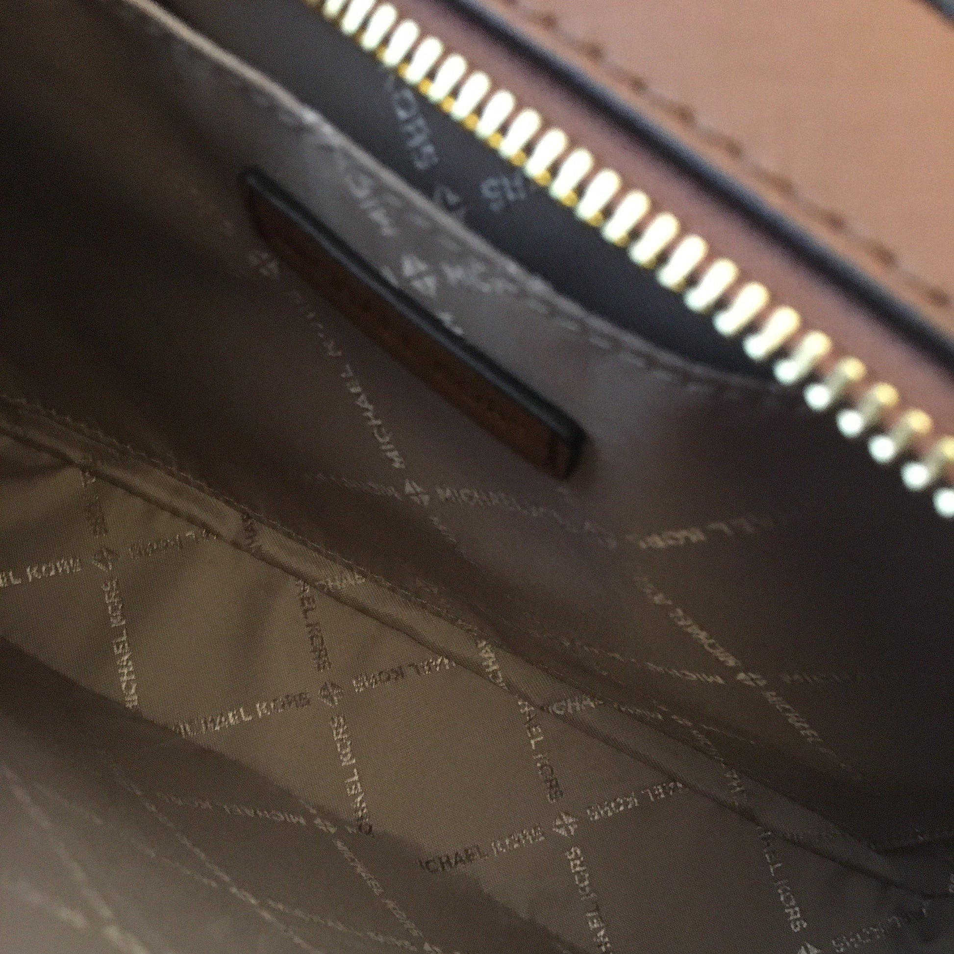 Michael Kors Vivianne designer crossbody bags grey branded polyester interior with slip pocket.